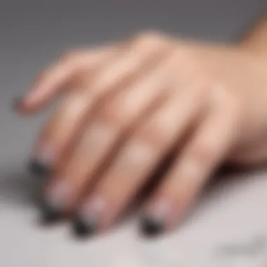 Elevating Elegance with Nail Polish Stickers A close-up of elegant French manicure using nail polish stickers